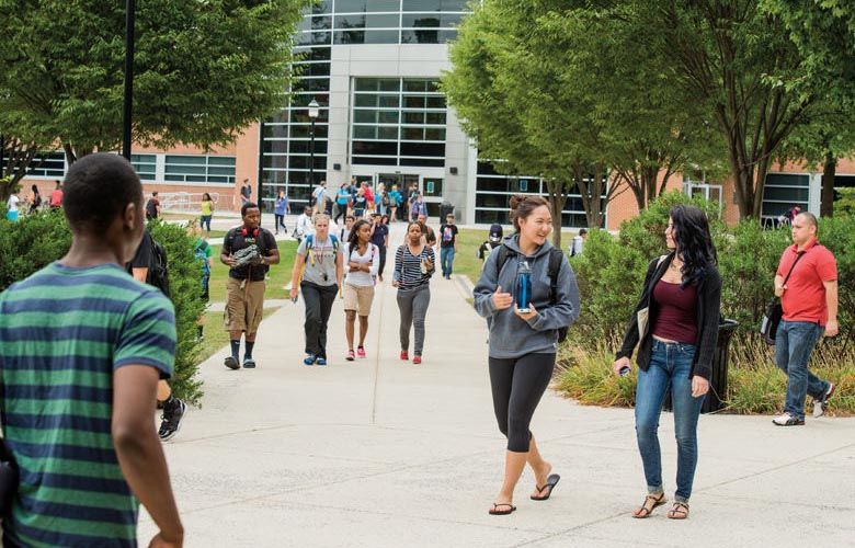 students walking on campus quad