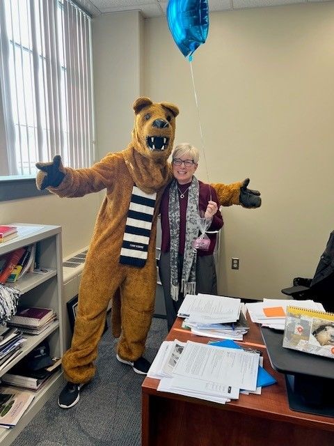 Yvonne Harhigh with Nittany Lion