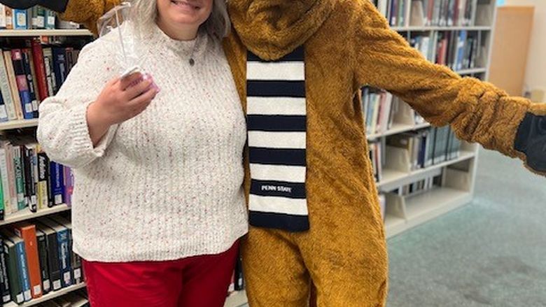 Bernadette A. Lear with Nittany Lion