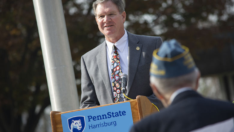 Doug Charney speaking at a Veterans Day ceremony