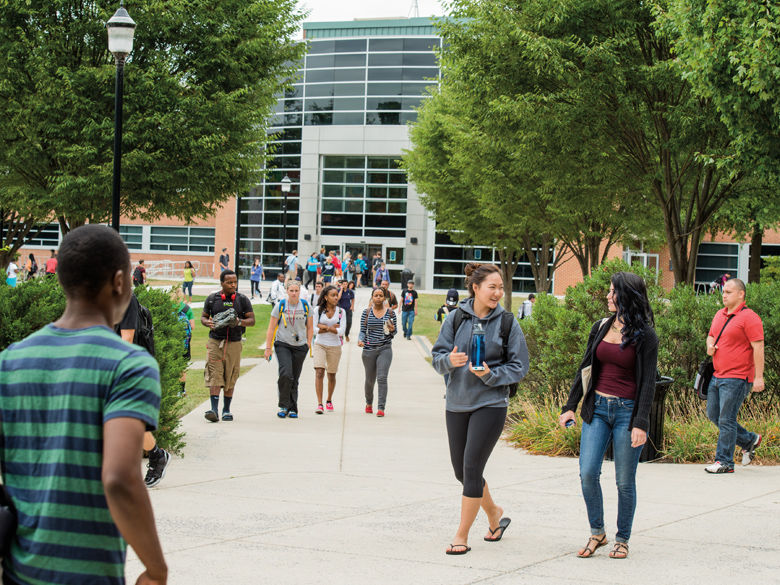 students walking on campus quad