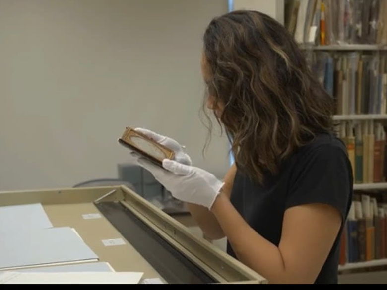 American Studies student working in the archives