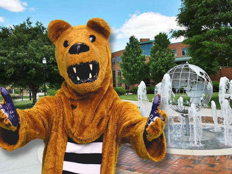 The Nittany Lion mascot with outstretched, welcoming arms