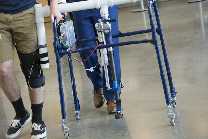 students testing prosthetic leg