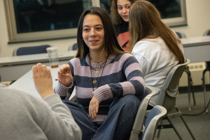 Students practice sign language in class