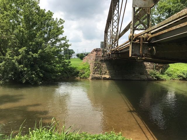 View of creek under a bridge