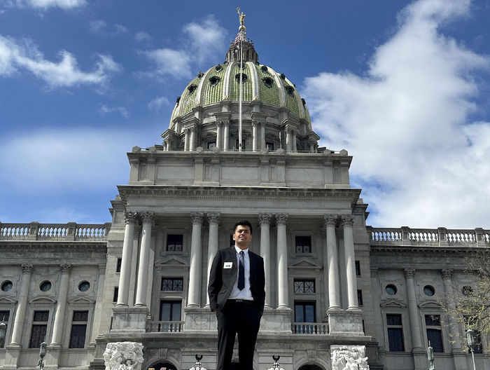 Anmol Garg stands in front of the state Capitol
