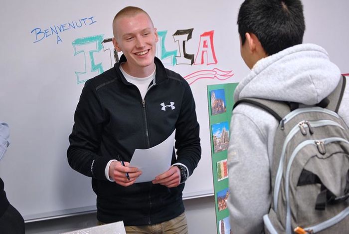 Two international students interacting