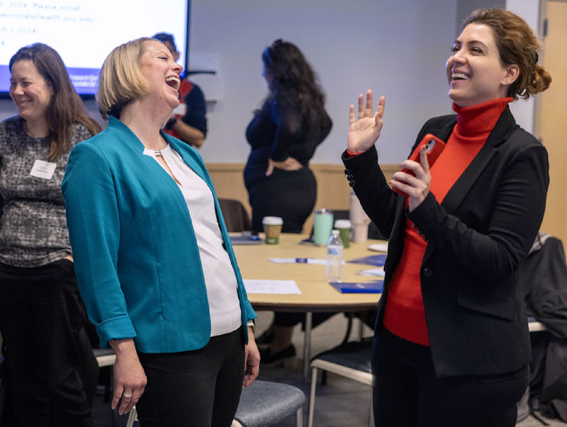 Dr. Jennifer Kraschnewski, left, and Sherri Kermanshachi, right laughing