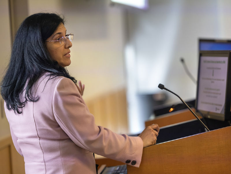 Dr. Ariana Pichardo-Lowden speaks at podium