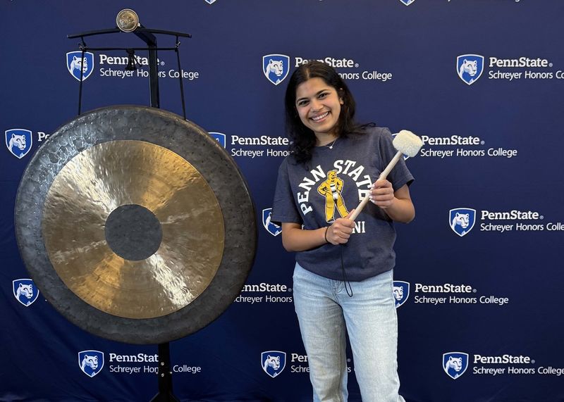 Purva Gupta rings the gong