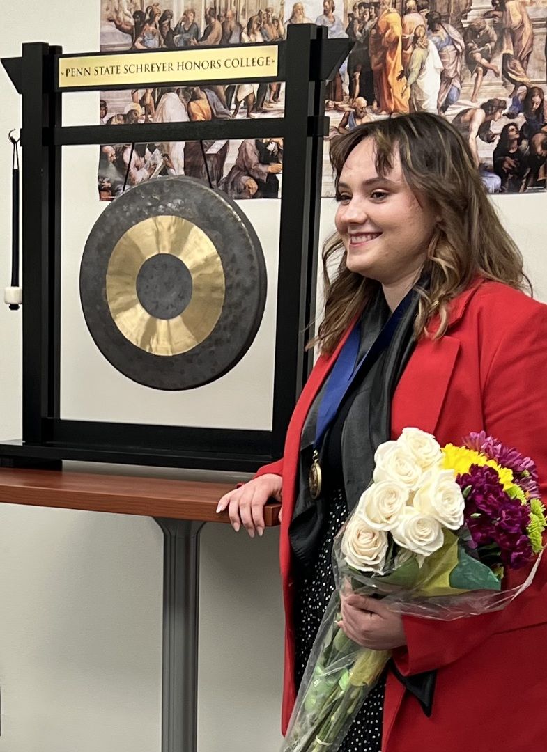 Viktoriia Vozharenko, a Scholar at Penn State Berks rings the gong