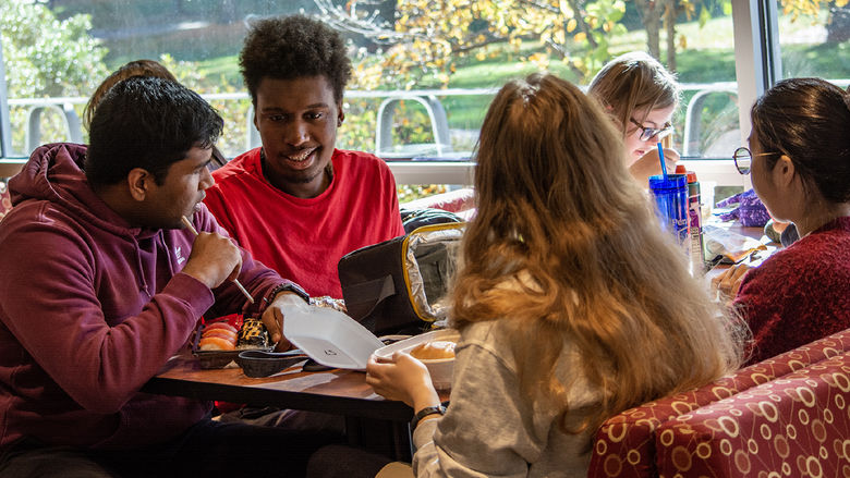 Peer mentors and Career studies students gather for lunch.