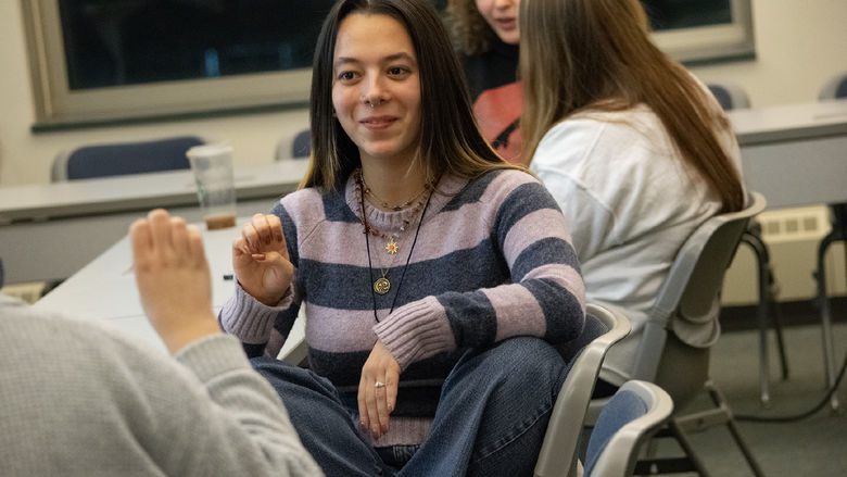 Students practice sign language in class