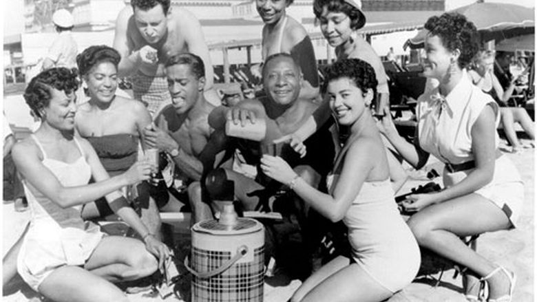 Sammy Davis, Jr. and a bevy of fans on Chicken Bone Beach