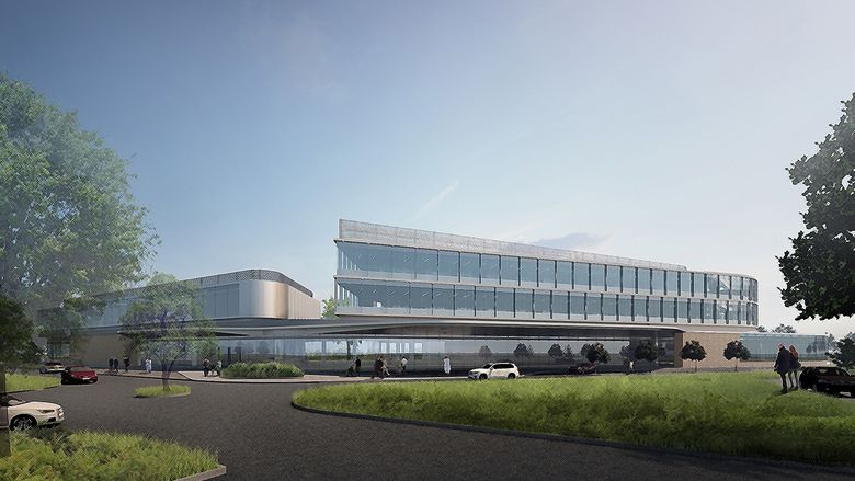 An artist's rendering shows the front view of a three story hospital