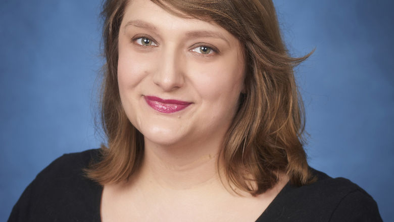 photo portrait of woman in dark blouse