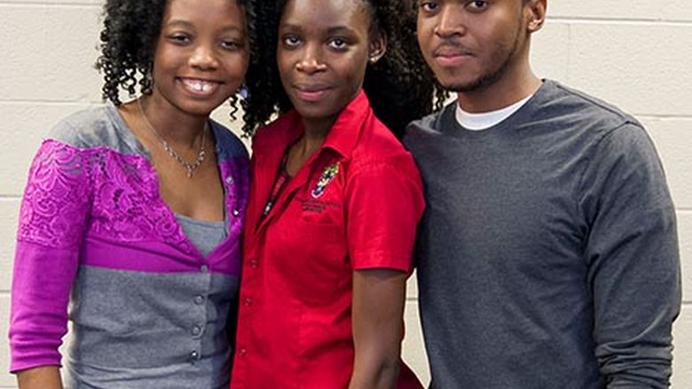 Two female and one male college age friends