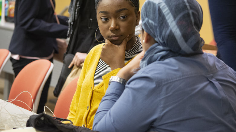 Faculty mentor, Ola Rashwan, speaks with high school student Zimirah Wilson at an EnvironMentors meeting in Harrisburg, Pennsylvania.