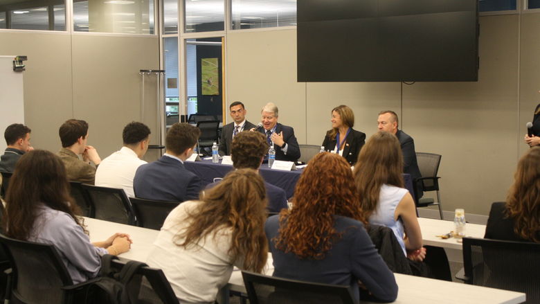 panel of Pennsylvania legislators talking to a group of students in an classroom setting