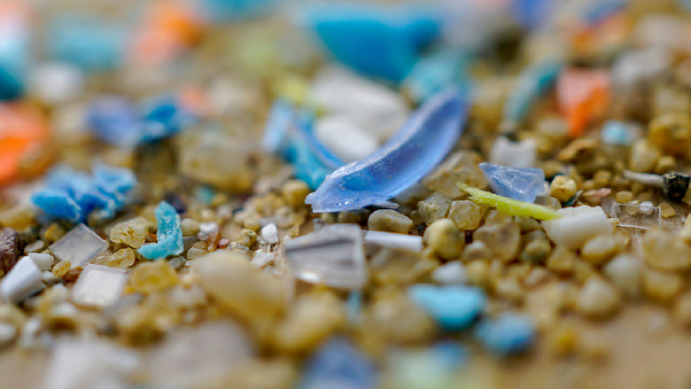 microplastics mixed among sand sediment