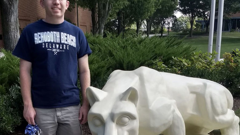 Nick Spohn with Lion Shrine at Penn State Harrisburg
