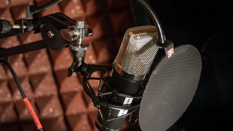 Closeup of a microphone in a podcast studio