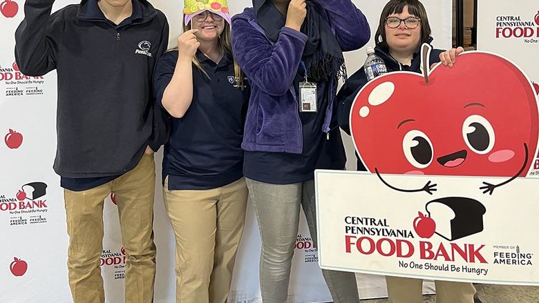 Practicum students at the Central PA Food Bank, where they work on essential job skills