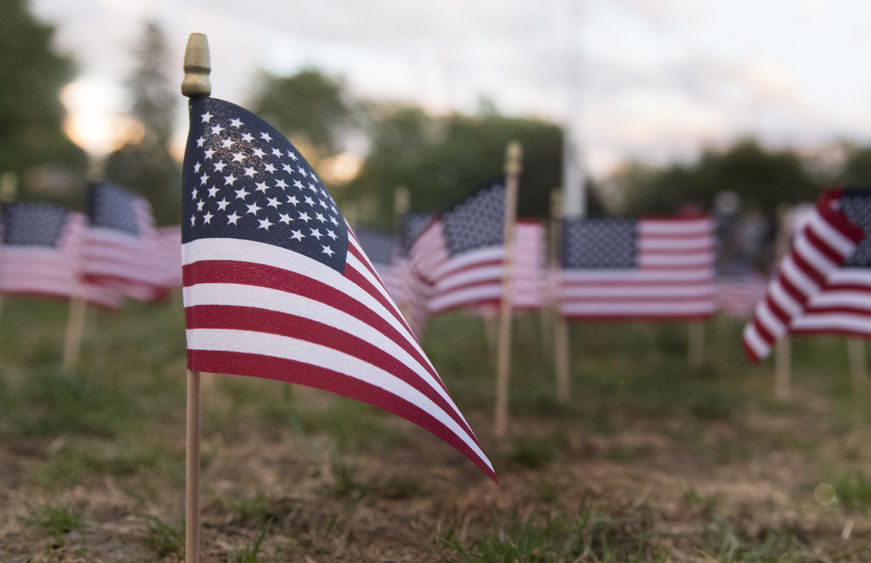 Close up flags on lawn