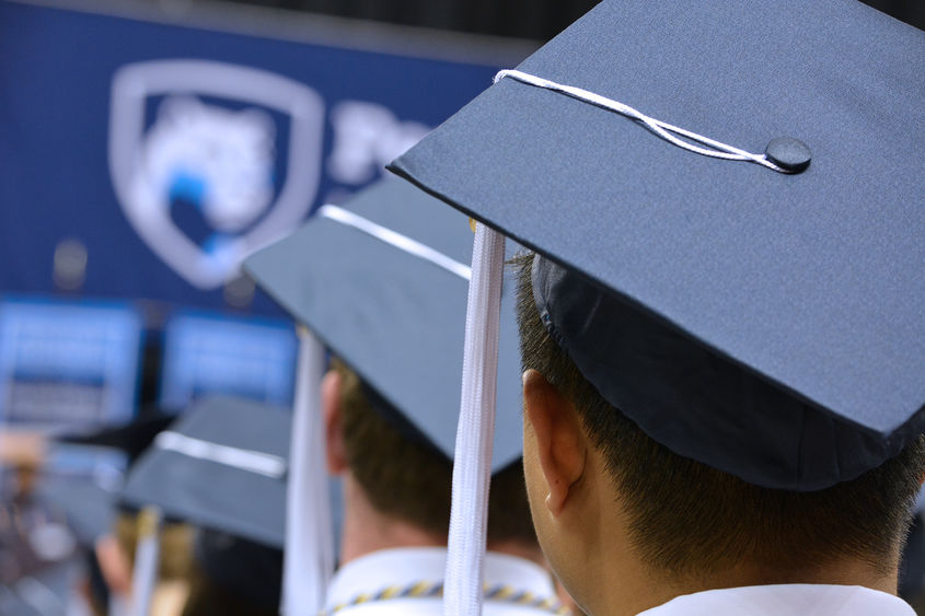 Student in Graduation Cap 