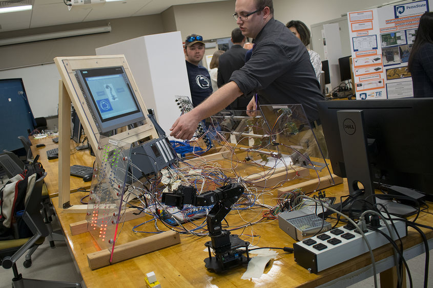 students testing circuits and wires