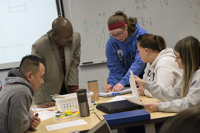 Dr. Reuben Asempapa with students