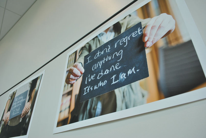 hands holding chalkboard message