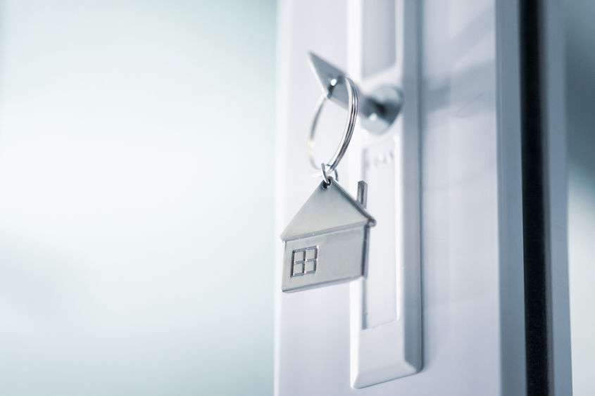 house shaped key in door