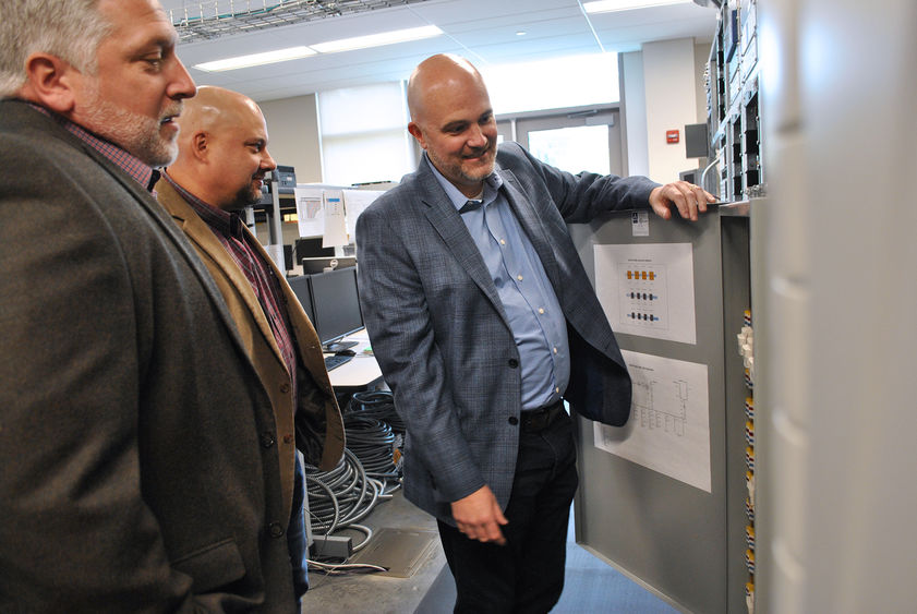 three men in engineering lab