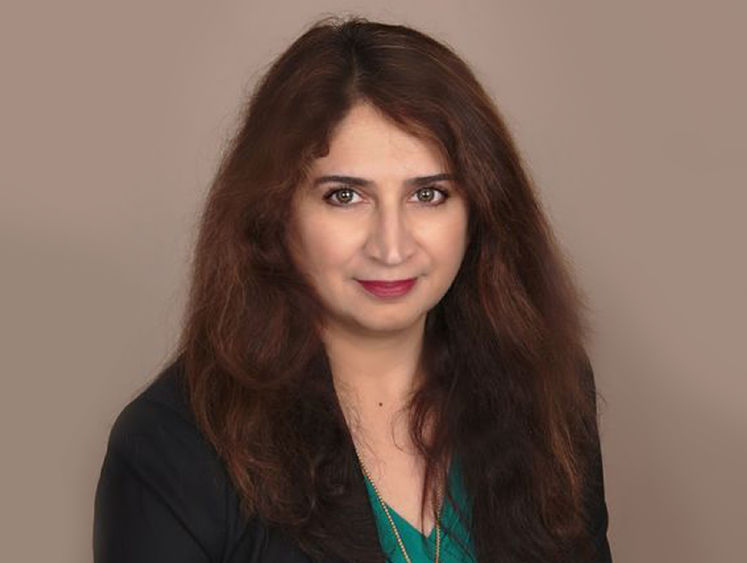 Headshot of Faiza Abbas