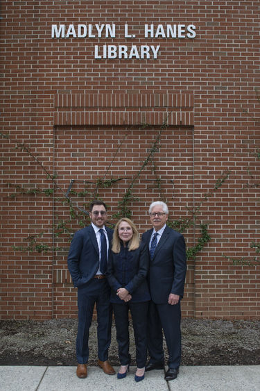 Madlyn Hanes, joined by son Michael R. Hanes and husband Michael L. Hanes, at the naming of the Harrisburg campus library in her honor