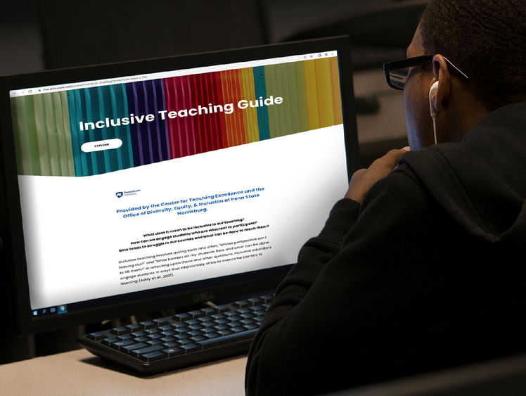 Photo of a person looking at a computer screen, showing the words "inclusive teaching guide"