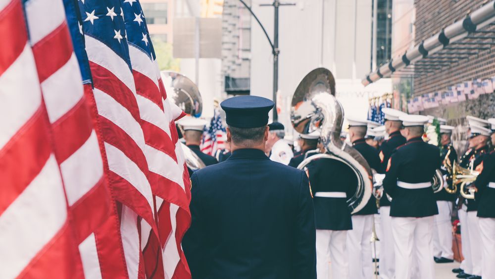 Officers, military band and flag