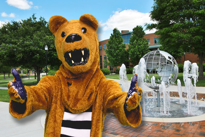 Nittany Lion Mascot in front of globe fountain on Harrisburg campus